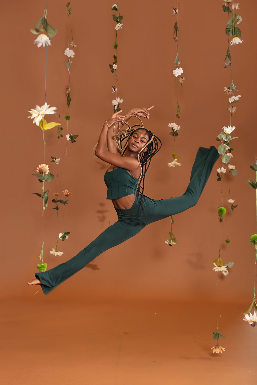 A Performance Track dancer mid-leap